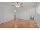 This bedroom has wood floors, and two doors at 522 Ne Connector Hwy, Albemarle, NC 28001