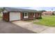 Charming brick home with a garage, front windows, and well-maintained landscaping at 522 Ne Connector Hwy, Albemarle, NC 28001