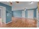 Open living area features hardwood floors and neutral walls at 522 Ne Connector Hwy, Albemarle, NC 28001