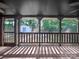 Inviting back porch with views of a shed and lawn, perfect for outdoor relaxation and enjoying the property's serene setting at 6401 Montpelier Rd, Charlotte, NC 28210