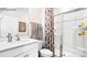 Clean bathroom featuring a glass shower, white vanity, and modern fixtures at 6708 Barcelona Way, Charlotte, NC 28214