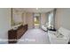 Bedroom featuring neutral decor, large windows, and comfortable seating area at 7030 Butternut Oak Ter, Huntersville, NC 28078