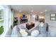 Spacious bonus room with comfortable seating, neutral carpet, and an open view of the stairs at 7030 Butternut Oak Ter, Huntersville, NC 28078