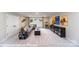 Cozy bonus room with a large sectional sofa, media console, and comfortable carpet at 7030 Butternut Oak Ter, Huntersville, NC 28078