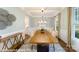 Bright dining room features coffered ceilings, wainscoting and lots of natural light at 7030 Butternut Oak Ter, Huntersville, NC 28078