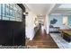 Inviting home hallway features hardwood floors, designer accents and an open floorplan at 7030 Butternut Oak Ter, Huntersville, NC 28078