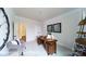 Well-lit office featuring a contemporary desk, accent chairs, and decor at 7030 Butternut Oak Ter, Huntersville, NC 28078