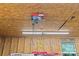 Well-equipped garage featuring a ceiling-mounted winch for heavy lifting and organization at 8101 Truelight Church Rd, Mint Hill, NC 28227