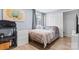 Bedroom with a large window, closet, and storage at 9606 Vinca Cir # E, Charlotte, NC 28213