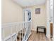 Well-lit hallway with neutral walls and vinyl floors at 9606 Vinca Cir # E, Charlotte, NC 28213