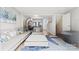 Cozy living room showcasing modern décor and open access to the kitchen and stairs at 9606 Vinca Cir # E, Charlotte, NC 28213