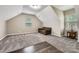 Large bonus room with carpet flooring and plenty of natural light at 10132 Caldwell Depot Rd, Cornelius, NC 28031