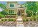 Lovely two-story home with stone accents, landscaped front yard, and welcoming entrance at 10132 Caldwell Depot Rd, Cornelius, NC 28031