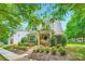 Charming two-story home with landscaped yard, stone accents and an inviting front porch at 10132 Caldwell Depot Rd, Cornelius, NC 28031