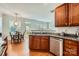 Open kitchen with granite countertops, stainless steel appliances and access to the breakfast area at 10132 Caldwell Depot Rd, Cornelius, NC 28031