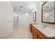 Bathroom with tile flooring, double sinks, and a separate shower and bathtub at 104 Mooreland Ne Dr, Conover, NC 28613