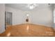 Large bedroom with hardwood floors and access to an ensuite bathroom at 104 Mooreland Ne Dr, Conover, NC 28613