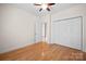Bedroom features wood floors, closet, and a door leading to another room at 104 Mooreland Ne Dr, Conover, NC 28613