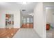 Hallway that connects the kitchen, living room, and bathroom of the home at 104 Mooreland Ne Dr, Conover, NC 28613
