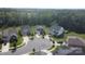 Aerial view of homes in a cul-de-sac featuring mature trees and well-maintained lawns at 10417 Bluejack Oak Ct, Huntersville, NC 28078