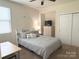 Cozy bedroom with neutral walls, carpeted flooring, a ceiling fan, and a closet at 10417 Bluejack Oak Ct, Huntersville, NC 28078