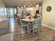 Stylish eat-in kitchen with stainless appliances, ample cabinetry, and room for dining at 10417 Bluejack Oak Ct, Huntersville, NC 28078