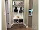 Mudroom features cubbies, shelving, and hooks, with easy access to the kitchen at 10417 Bluejack Oak Ct, Huntersville, NC 28078
