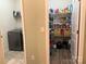 Pantry with shelving provides ample storage space at 10417 Bluejack Oak Ct, Huntersville, NC 28078