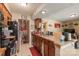 Efficient kitchen with stainless steel appliances, ample counter space, and open access to living areas at 11069 Running Ridge Rd, Charlotte, NC 28226