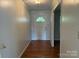 Inviting foyer features hardwood floors and a classic front door at 1116 Fieldstone Rd, Mooresville, NC 28115