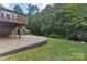 Stunning backyard with a patio and well-maintained lawn and landscaping at 1119 Williamstown Rd, Matthews, NC 28105