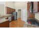 Spacious kitchen featuring granite countertops, stainless steel appliances, and wooden floors at 1119 Williamstown Rd, Matthews, NC 28105