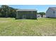 Spacious backyard with lush green grass, ideal for outdoor activities and relaxation at 11533 Valley Oak Ln, Stanfield, NC 28163