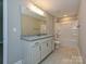 Bathroom featuring a vanity, tub-shower combo and modern fixtures at 11533 Valley Oak Ln, Stanfield, NC 28163