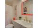 Bright bathroom with a modern vanity, stylish mirror, and charming tropical-themed decorations at 116 Hallett St, Fort Mill, SC 29715