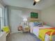 Cozy bedroom featuring a bright yellow bedframe and colorful pillows, creating a cheerful space at 116 Hallett St, Fort Mill, SC 29715