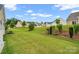 Expansive backyard features lush lawn and mature landscaping at 11608 Downy Birch Rd, Charlotte, NC 28227