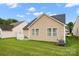 Well-maintained backyard with neutral siding and view of the lawn at 11608 Downy Birch Rd, Charlotte, NC 28227