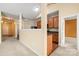 Galley kitchen with wood cabinets, stainless steel appliances and an open plan layout at 11608 Downy Birch Rd, Charlotte, NC 28227
