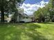 Spacious backyard showcasing a deck and ample green space, perfect for outdoor activities and relaxation at 118 Hemphill Ave, Chester, SC 29706