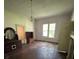 Bedroom with hardwood floors, a chandelier and ample natural light at 118 Hemphill Ave, Chester, SC 29706