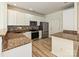 Modern kitchen featuring granite countertops, stainless steel appliances, and white cabinetry at 12131 Honor Guard Ave, Charlotte, NC 28277