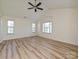 Spacious main bedroom with vaulted ceilings and natural light at 12131 Honor Guard Ave, Charlotte, NC 28277