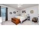 Inviting bedroom with neutral tones, wood chest, and cozy sitting area at 126 W Morehouse Ave, Mooresville, NC 28117