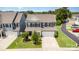 Charming two-story home boasts a manicured lawn, mature landscaping, and an inviting curb appeal in a Gathering-friendly neighborhood at 126 W Morehouse Ave, Mooresville, NC 28117