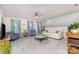 Comfortable living room featuring plush seating, neutral tones, and natural light at 126 W Morehouse Ave, Mooresville, NC 28117