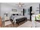 Relaxing primary bedroom featuring modern decor and plush bedding at 126 W Morehouse Ave, Mooresville, NC 28117