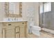 Inviting bathroom featuring a beautifully crafted vanity, modern fixtures, and a glass-enclosed shower at 141 Castle Dr, Mooresville, NC 28117