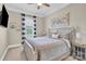 Comfortable bedroom with a plush bed, soft lighting, and tasteful decor for a cozy retreat at 141 Castle Dr, Mooresville, NC 28117
