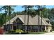 Charming single-story home with stone accents and well-manicured landscaping at 141 Castle Dr, Mooresville, NC 28117